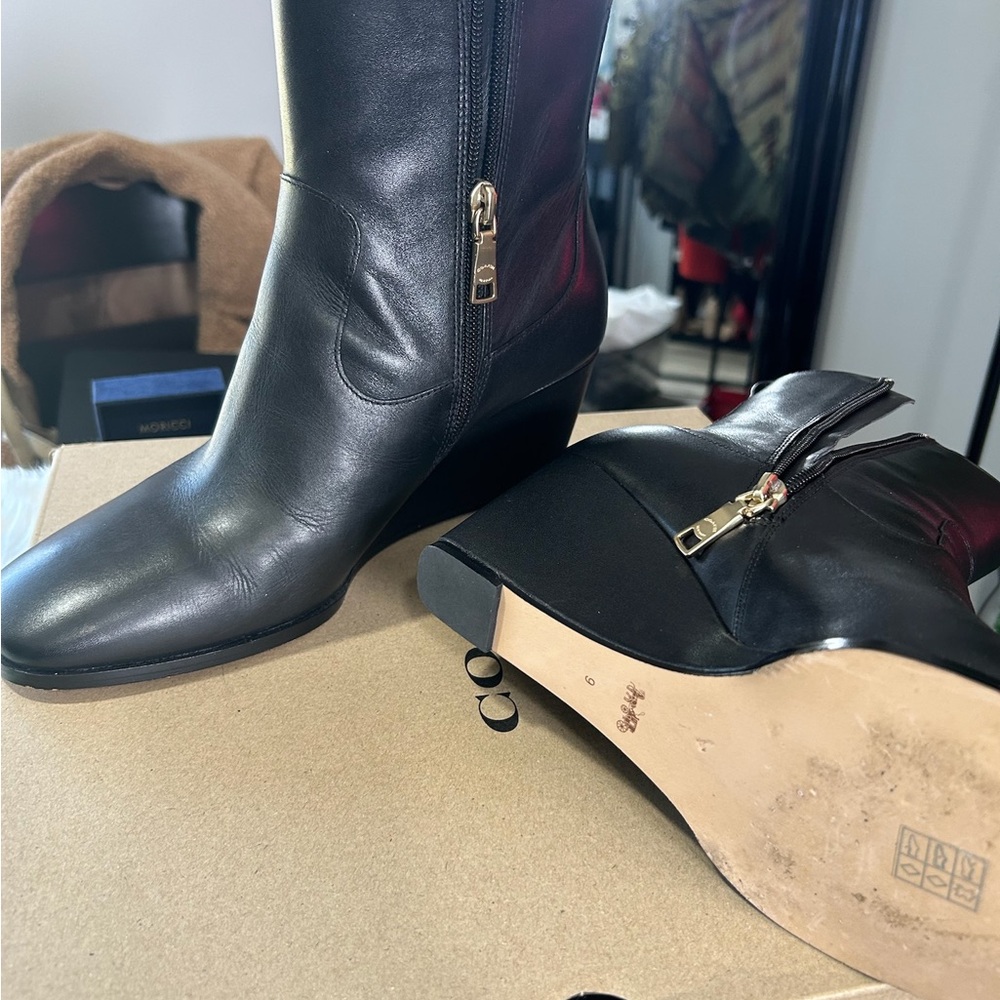 Coach Black Leather Heeled Boots with Gold Accents